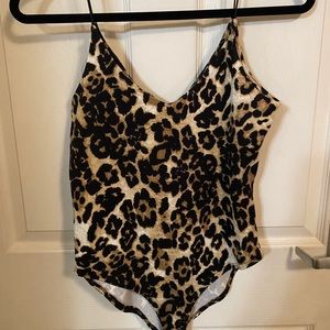 Leaped print body suit